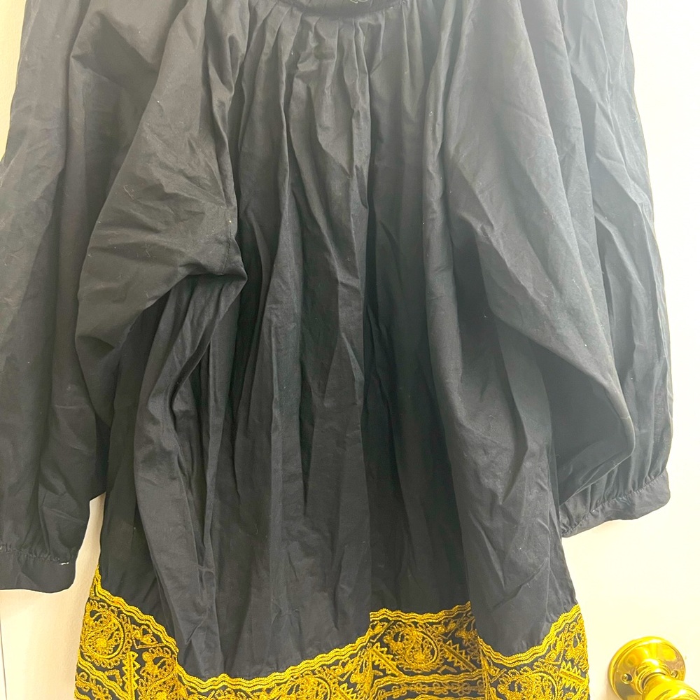 Black off the shoulder top with gold detail